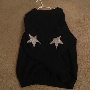 Black sweater with star patches